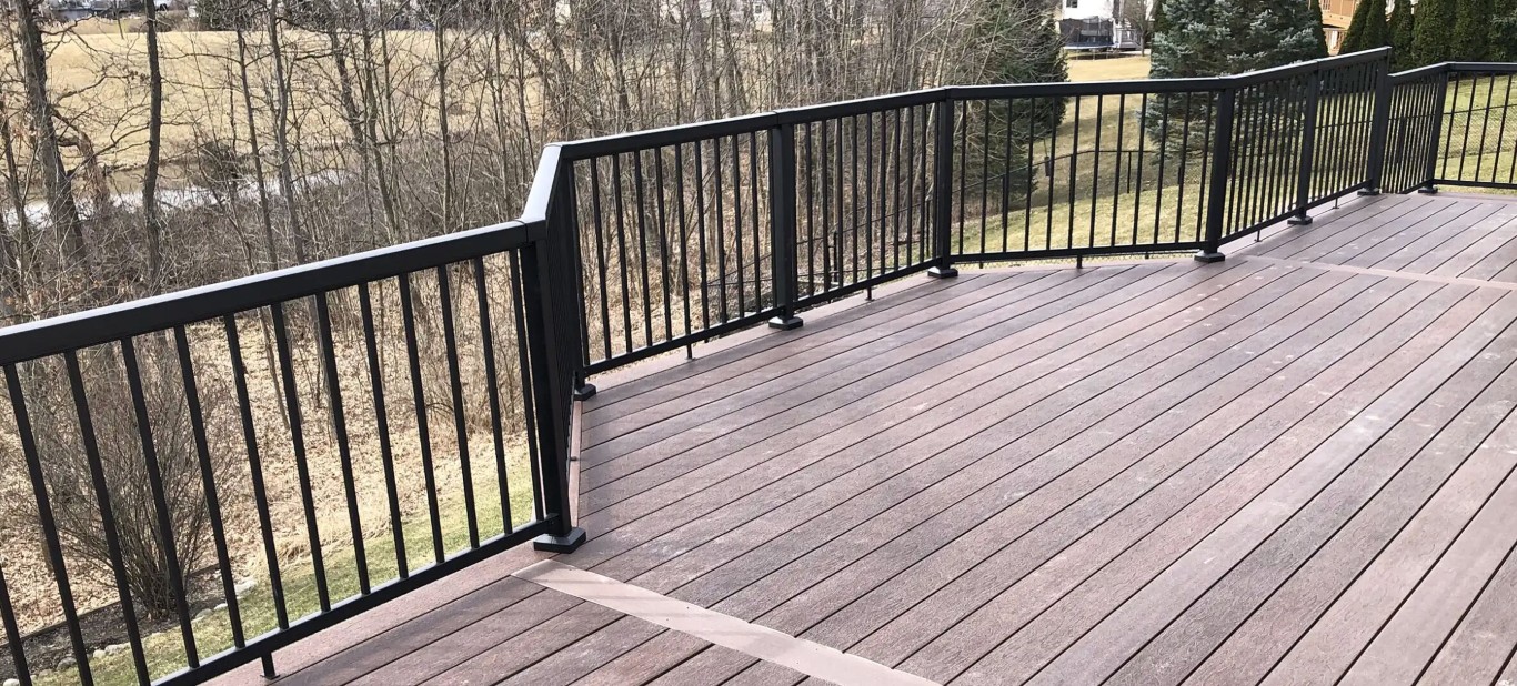 Deck replacement and rebuild with black railings in Eastvale, CA